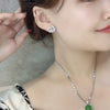 Wholesale Women's Vintage Elegance Copper Hollow Flower Camellia Style Earrings Set With Zircon