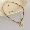 Wholesale Women's Vintage Ethnic Style Stained Glass Beaded Elephant Pendant Necklace With Handmade Niche Collarbone Chain Geometric And Animal Pattern