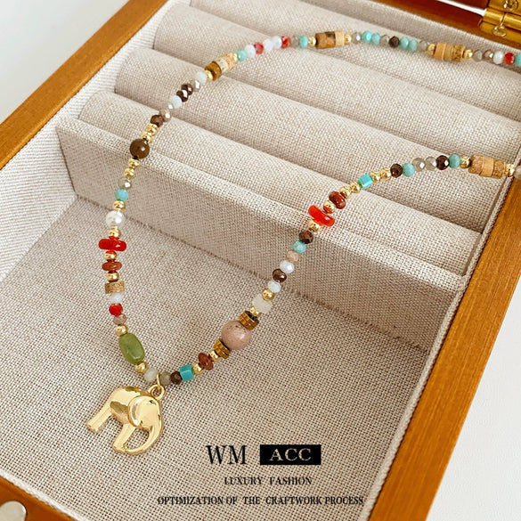 Wholesale Women's Vintage Ethnic Style Stained Glass Beaded Elephant Pendant Necklace With Handmade Niche Collarbone Chain Geometric And Animal Pattern