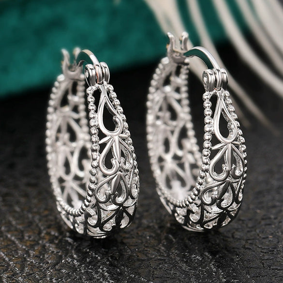 Wholesale Women's Vintage Fashion Ol Style Copper Ushaped Carved Hollow Pattern Electroplated Earrings