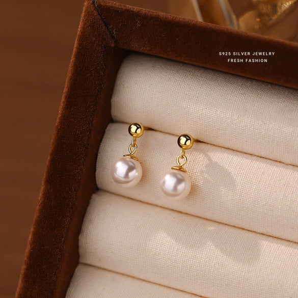 Wholesale Women's Vintage Geometric Round Earrings Made Of S925 Sterling Silver And Imitation Pearls With Electroplating