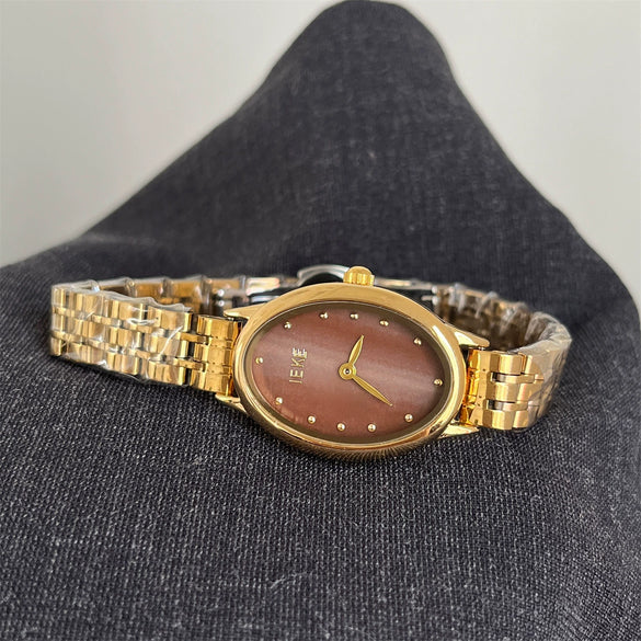 Wholesale Women's Vintage Style Oval Motherofpearl Dial Steel Band Watch With Alloy Case And Stainless Steel Buckle