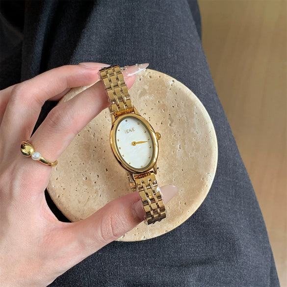 Wholesale Women's Vintage Style Oval Motherofpearl Dial Steel Band Watch With Alloy Case And Stainless Steel Buckle