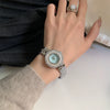 Wholesale Women's Watch With Diamondencrusted Motherofpearl Face Stainless Steel Band Alloy Strap Round Dial Metal Case