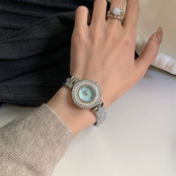 Wholesale Women's Watch With Diamondencrusted Motherofpearl Face Stainless Steel Band Alloy Strap Round Dial Metal Case