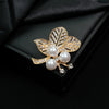Wholesale Women's Zinc Alloy Brooch With Flower And Leaves Pattern Electroplated And Inlaid With Rhinestone Pearl