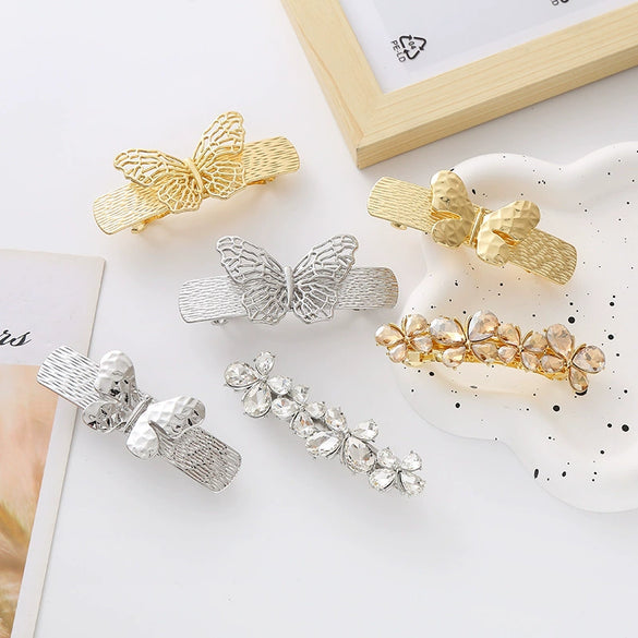 Wholesale Women's Zinc Alloy Hollow Metal Bow Spring Clip Hairpin With Electroplating And Baroque Style And Rhinestones