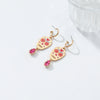 Wholesale Women's Zinc Alloy Skull Heart Geometric Print Dropshaped Pendant Earrings With Electroplating