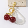 Wholesale Zinc Alloy Fruit Shape Electroplated Resin Cherry Pearl Key Chain Pendant Luggage Charms