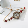 Women's Alloy And Stainless Steel Four Leaf Clover Fashion Pull Bracelet Watch With Round Dial