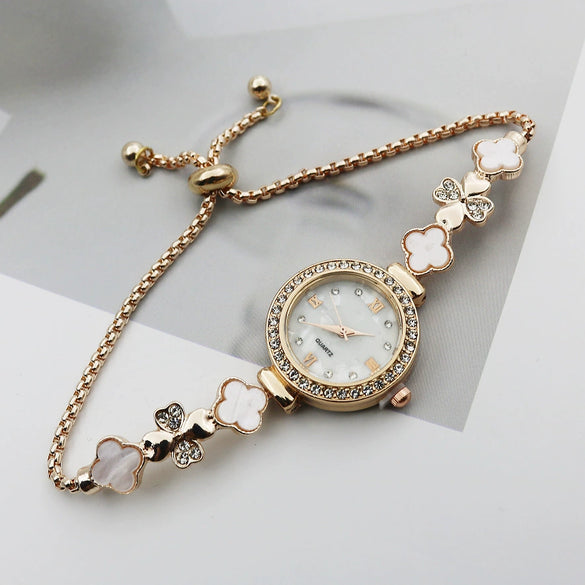 Women's Alloy And Stainless Steel Four Leaf Clover Fashion Pull Bracelet Watch With Round Dial