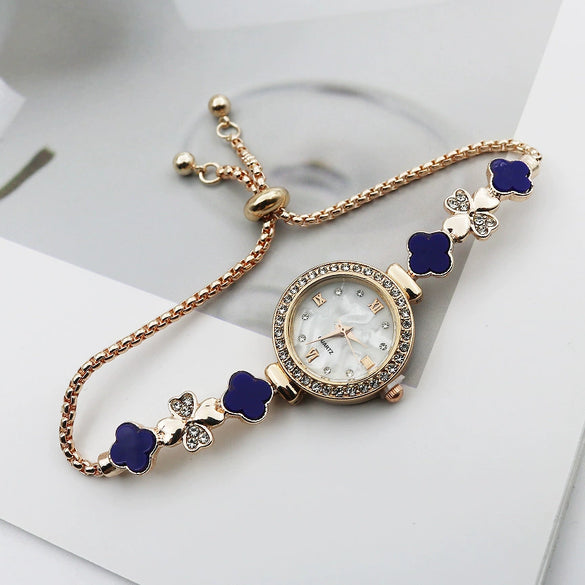 Women's Alloy And Stainless Steel Four Leaf Clover Fashion Pull Bracelet Watch With Round Dial