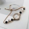 Women's Alloy And Stainless Steel Four Leaf Clover Fashion Pull Bracelet Watch With Round Dial
