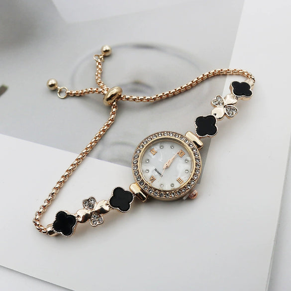 Women's Alloy And Stainless Steel Four Leaf Clover Fashion Pull Bracelet Watch With Round Dial