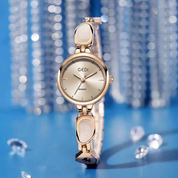 Women's Alloy Band And Case Fashion Light Luxury Disc Elegant Quartz Watch With Sun Pattern And Spiral Crown