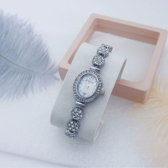 Women's Alloy Bracelet Quartz Watch Fashion Round Dial Mineral Reinforced Glass Mirror Stainless Steel Buckle