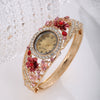 Women's Alloy Bracelet Watch With Decorative Flower And Round Dial Fashion Style