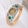 Women's Alloy Bracelet Watch With Decorative Flower And Round Dial Fashion Style