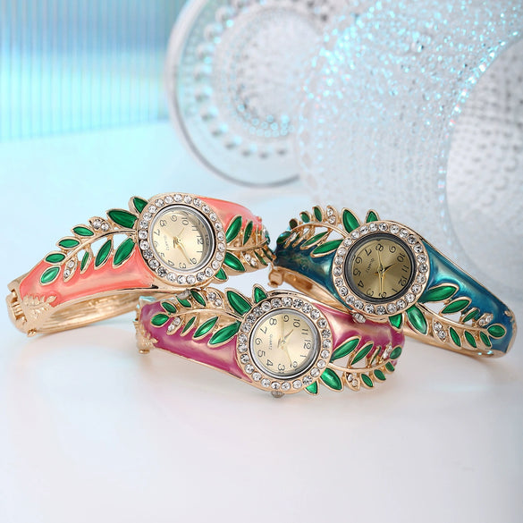 Women's Alloy Bracelet Watch With Decorative Leaf And Round Dial