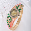 Women's Alloy Bracelet Watch With Decorative Leaf And Round Dial