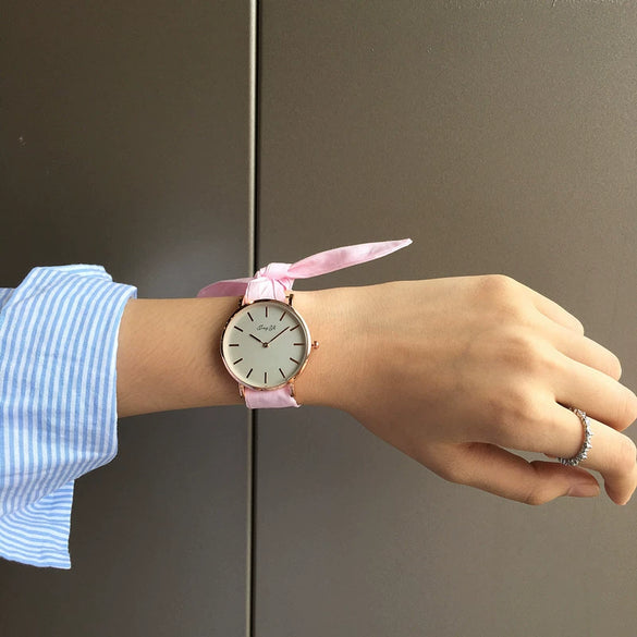 Women's Alloy Case Cloth Belt Round Dial Printed Logo Canvas Strap Leisure Watch