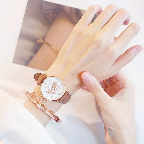 Women's Alloy Case Imitation Leather Strap Quartz Watch With Butterfly Dial And Star Bracelet Leisure Style