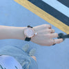 Women's Alloy Case Imitation Leather Strap Round Dial Casual Fashion Watch With Printed Logo