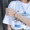 Women's Alloy Case Imitation Leather Strap Round Dial Casual Fashion Watch With Printed Logo
