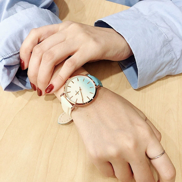 Women's Alloy Case Imitation Leather Strap Round Dial Watch With Printed Logo Retro And Leisure Style