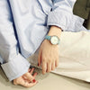 Women's Alloy Case Imitation Leather Strap Round Dial Watch With Printed Logo Retro And Leisure Style