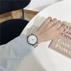 Women's Alloy Case Ordinary Glass Mirror Pointer Quartz Watch With Simple Elegant White Belt And Leisure Style