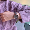 Women's Alloy Case Quartz Watch With Imitation Leather Strap And Stainless Steel Horseshoe Buckle Round Dial Sports Style
