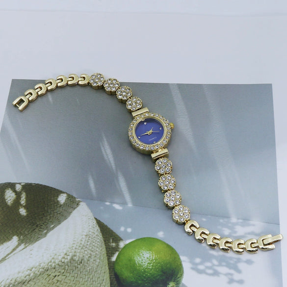 Women's Alloy Casual Quartz Bracelet Watch With Round Dial And Stainless Steel Buckle