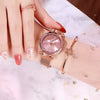 Women's Alloy Casual Round Dial Magnet Buckle Quartz Watch