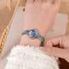 Women's Alloy Chain Round Dial Motherofpearl Quartz Watch With Fishtail Hand And Spiral Crown