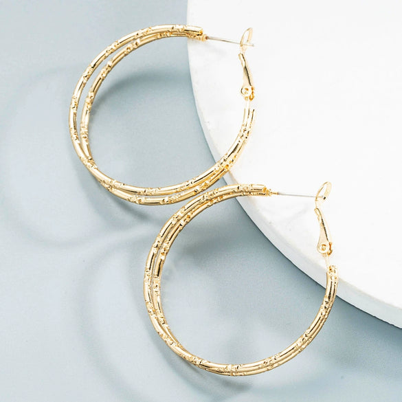 Women's Alloy Cshaped Geometric Hoop Earrings With Engraved Circle Design And Statement Fashion Style