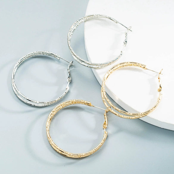 Women's Alloy Cshaped Geometric Hoop Earrings With Engraved Circle Design And Statement Fashion Style
