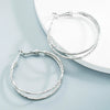 Women's Alloy Cshaped Geometric Hoop Earrings With Engraved Circle Design And Statement Fashion Style
