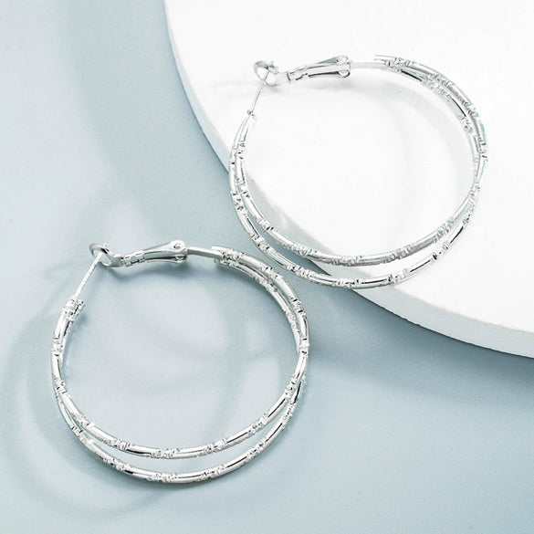 Women's Alloy Cshaped Geometric Hoop Earrings With Engraved Circle Design And Statement Fashion Style