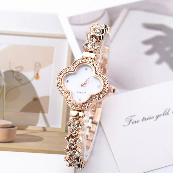Women's Alloy Flower Shape Quartz Watch With Fourleaf Clover Design And Pin Buckle