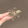 Women's Alloy Hollow Lily Brooch Electroplating Highend Light Luxury Design