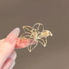 Women's Alloy Hollow Lily Brooch Electroplating Highend Light Luxury Design