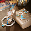 Women's Alloy Leaf Bracelet Quartz Watch Round Dial Stainless Steel Buckle Fashionable Style