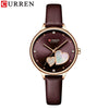 Women's Alloy Leather Casual Round Waterproof Quartz Watch With Pin Buckle And Onion Crown