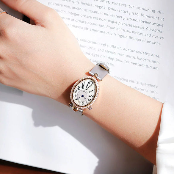 Women's Alloy Leather Gold Clasp Oval Dial Fashion Waterproof Quartz Watch