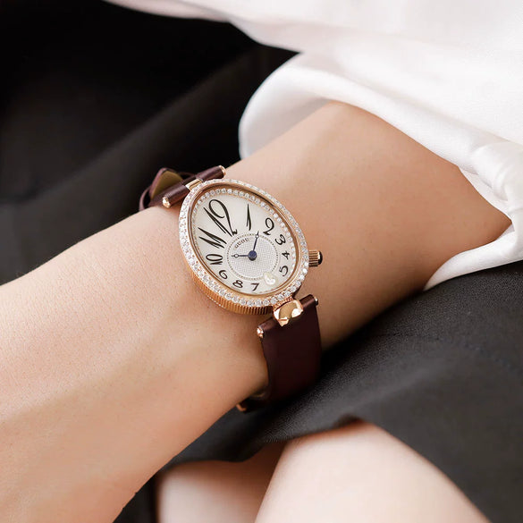 Women's Alloy Leather Gold Clasp Oval Dial Fashion Waterproof Quartz Watch