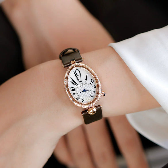 Women's Alloy Leather Gold Clasp Oval Dial Fashion Waterproof Quartz Watch