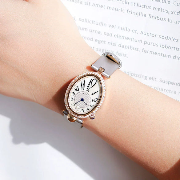 Women's Alloy Leather Gold Clasp Oval Dial Fashion Waterproof Quartz Watch