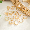 Women's Alloy Plated Imitation Pearl Sunflower Ring Set With Smooth Teardrop Stacked Rings And Geometric Floral Designs