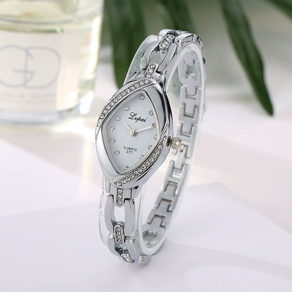 Women's Alloy Quartz Fashion Round Outdoor Watch With Spiral Crown And Pin Buckle